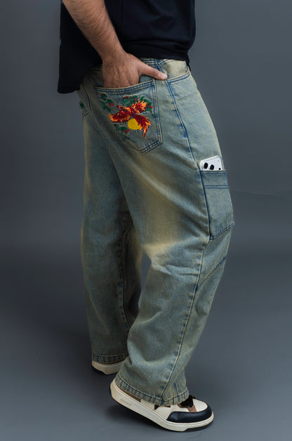 Person wearing baggy vintage jeans by ORE OFE 