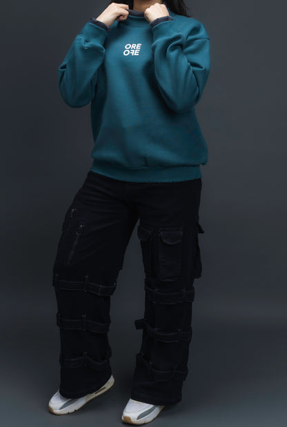 Person wearing a Green sweatshirt with 'ORE OFE' logo on centre of the chest