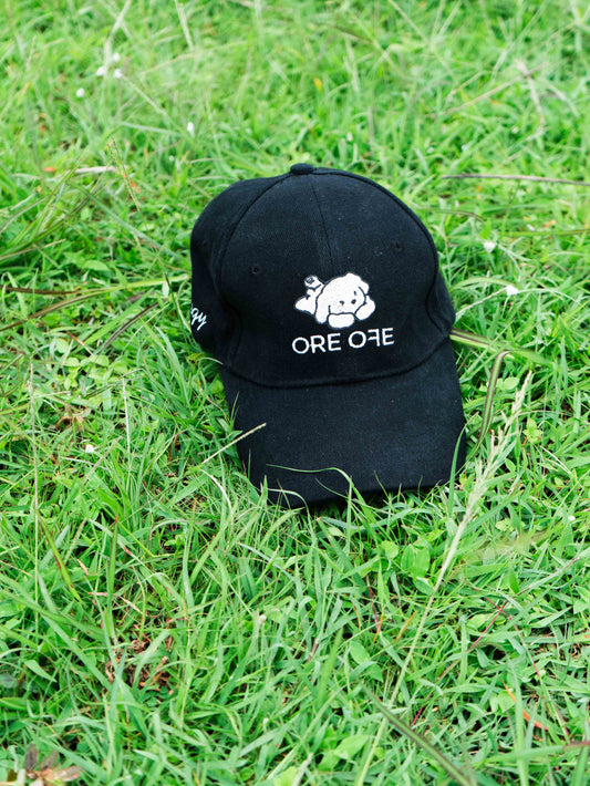 Black ORE OFE cap with a playful dog logo