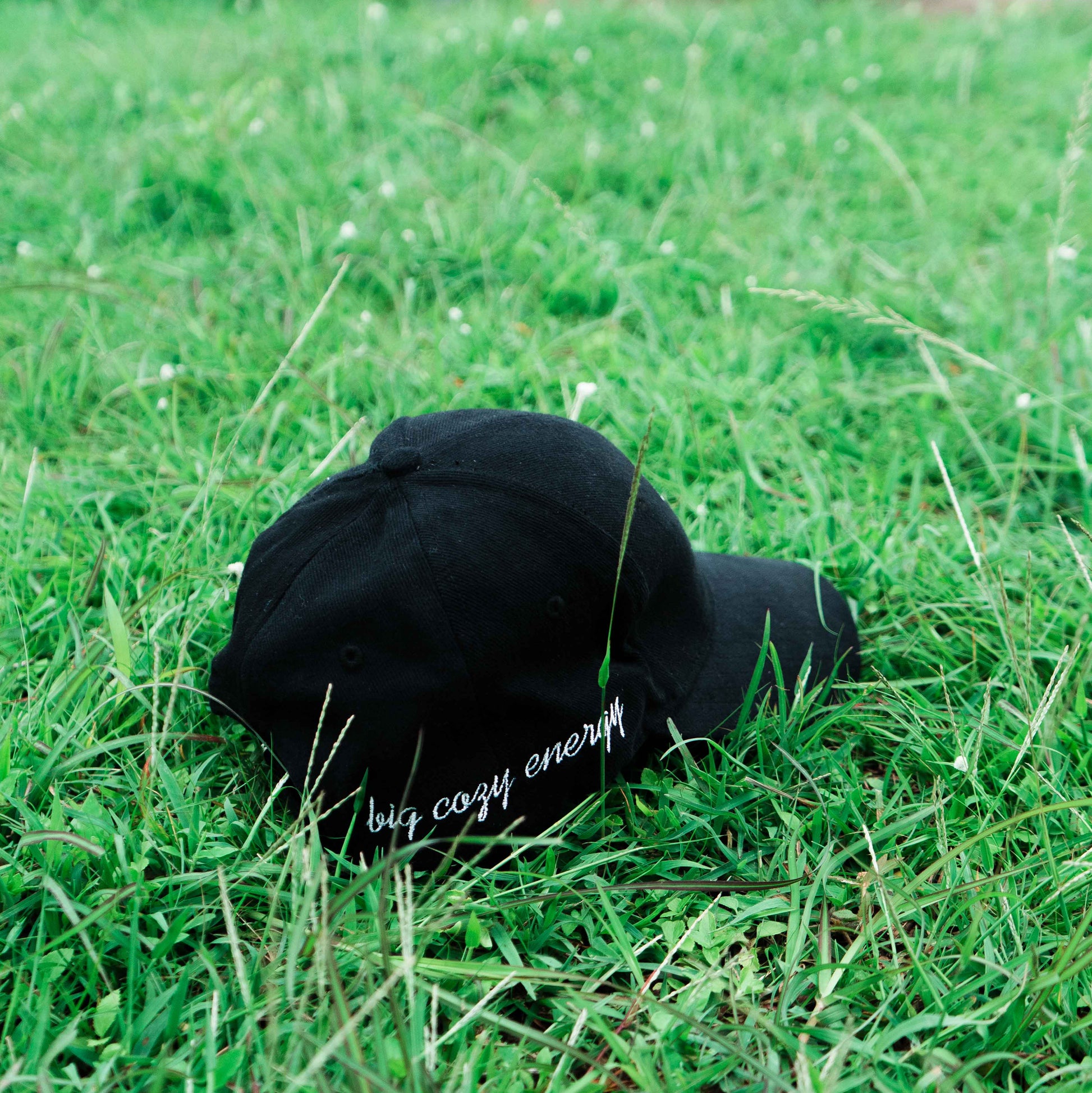 Black ORE OFE cap that reads big cozy energy
