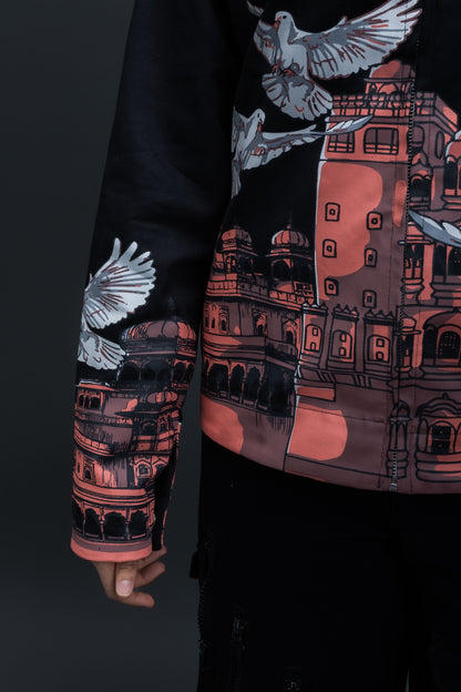 Person wearing a black heritage jacket by ORE OFE that is designed with the theme of Hawa Mahal